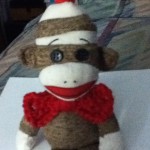 Brenda made a bow tie for her sock monkey.