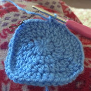 This is Emily's very  first hat in progress.
