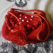 Faiza is on a roll with another crocheted purse.