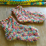 Carol finished a pair of warm socks for the winter.