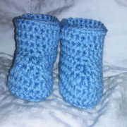 Carol crocheted these little baby booties.