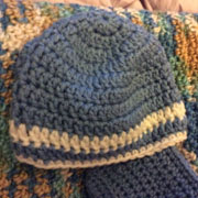 This blue and white striped hat is crocheted by Carol.