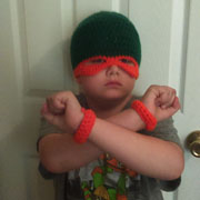 This ninja turtle hat and cuffs are made by Susanne.