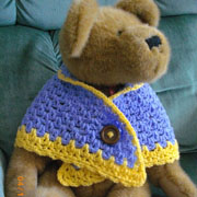 Lillian frogged her sweater and made a cute teddy bear shawl.