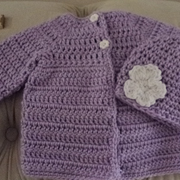Cynthia crocheted this baby sweater and hat set.
