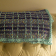 Cynthia finished this plaid crocheted blanket.