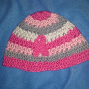Susanne crocheted this pink hat for breast cancer awareness. 