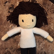 Teisha's doll is completed.  Now time to crochet more clothes.
