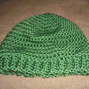 Daelynn crocheted this green hat with a ribbed edging.