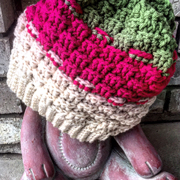 Debbie crocheted this green, pink, and white hat.