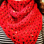 This red shawl was crocheted by Debbie.