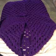 Fiona is working on this purple granny shrug.