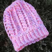 Debbie finished crocheting this pink hat.