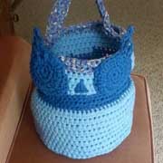 Patricia finished crocheting this owl basket.