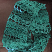 This pretty turquoise scarf is crocheted by Michele.