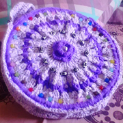 I'm loving the bead work on Faiza's bag.