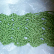 This green scarf was crocheted by Carol.