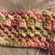 Carol frogged this piece to make  a blanket.