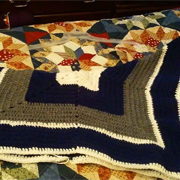 Grace finished crocheting this blue and grey blanket.