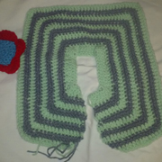 Susanne is working on a new crocheted outfit.