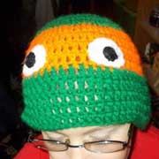 Melinda finished crocheting this turtle hat.