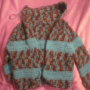 Susanne is working on another sweater for her grandson.