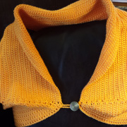 Lee finished crocheting this pretty bolero wrap.