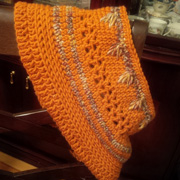 Look at Diane's cowl with orange and variegated yarn.